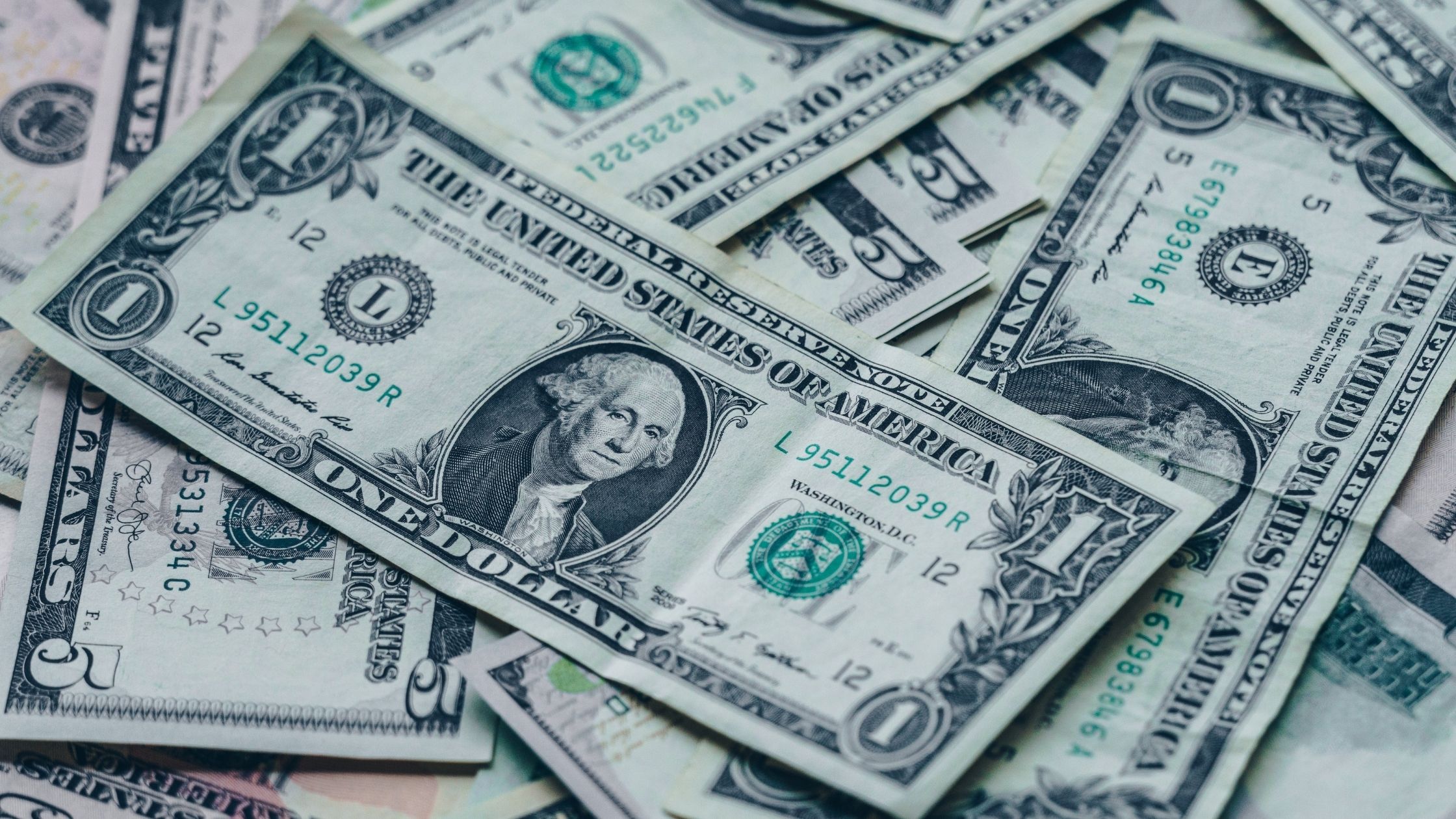 Dollar closes high