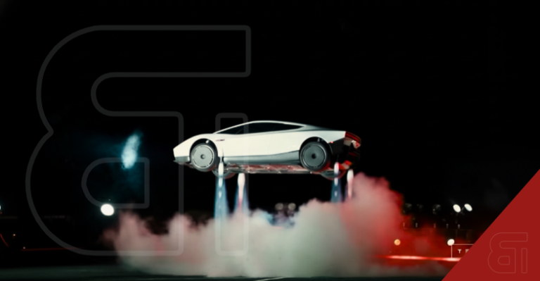A white Tesla Roadster hovers in mid-air at night, propelled by downward-firing rocket thrusters emitting blue flames and thick smoke, illuminated by red and white stage lights.